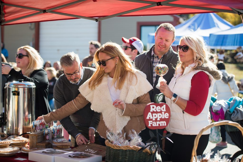 group shopping at a fall festival